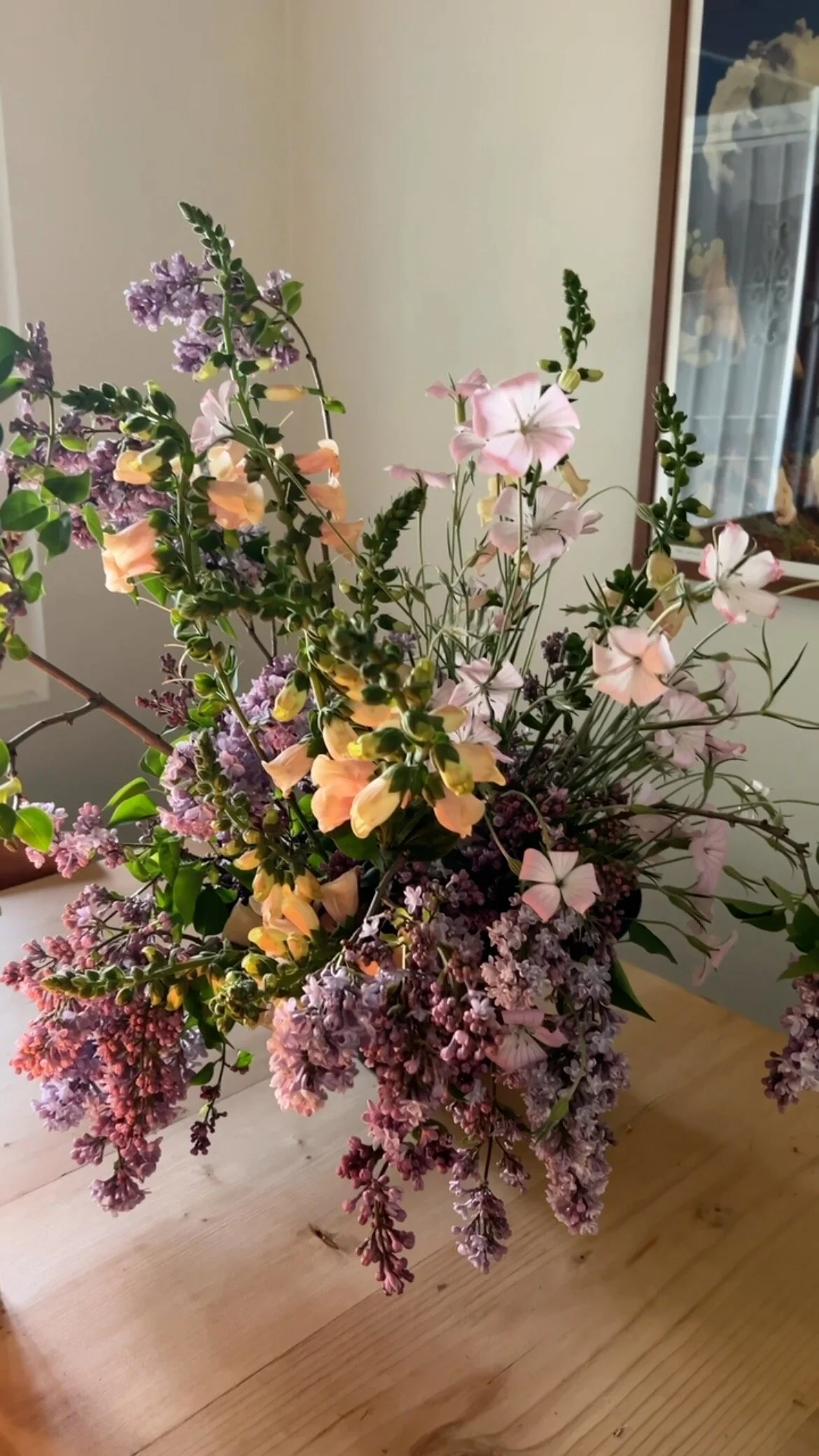 Colorful garden-gathered arrangement with an organic edge